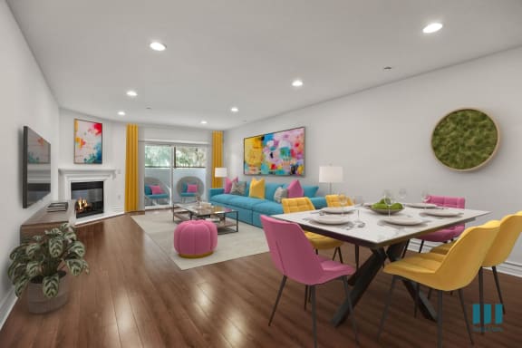 a living room with a couch and a table  and a bed