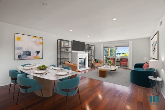 a kitchen with gray cabinets and white countertops