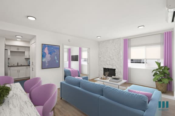 a living room with a couch and a table  and a bed