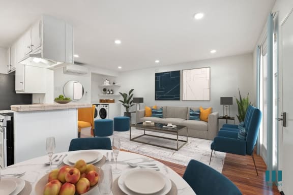 a living room with a blue couch and a table and chairs