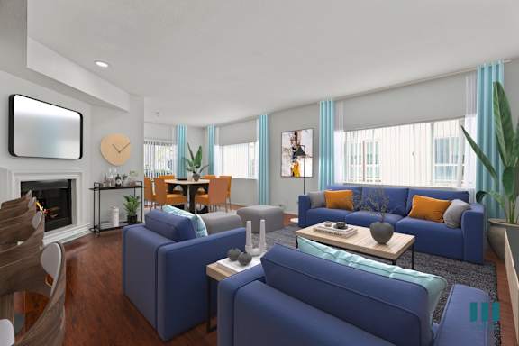 a living room with a couch and a table  and a bed