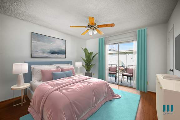 A bedroom with a bed, a ceiling fan, and a painting on the wall.