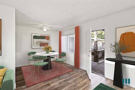 a living room with a couch and a table  and a bed
