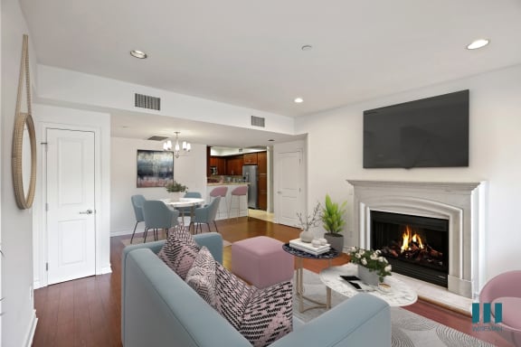 a kitchen with white cabinetry and stainless steel appliances