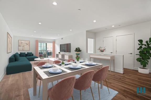 a kitchen and dining area in a 555 waverly unit