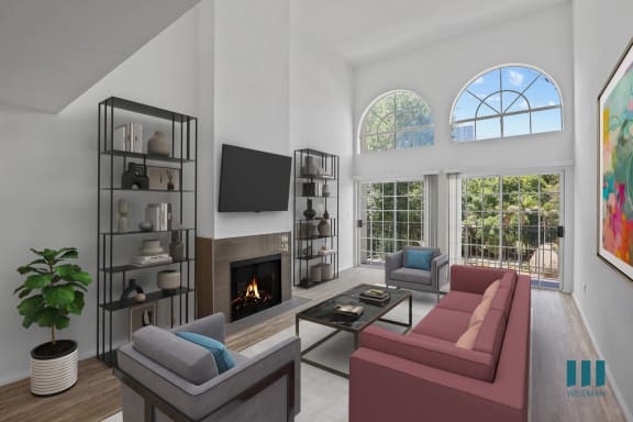 a living room with a fireplace and a tv