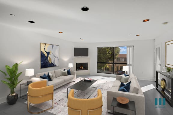 a living room with white walls, a large window, a leather couch and a glass coffee