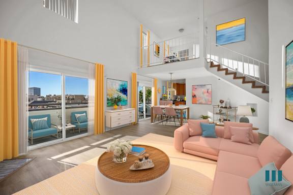 a living room with a couch and chairs and a table
