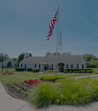 a house with an flag in front of it