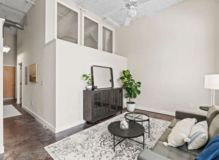 a living room with a couch and a table