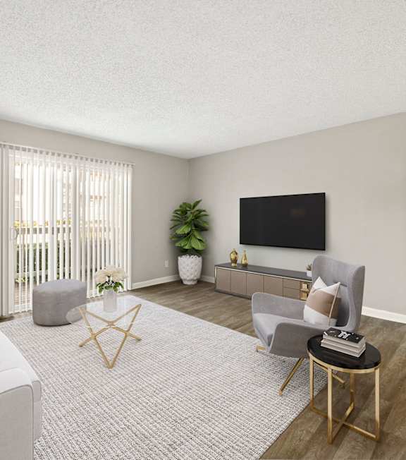 our apartments offer a living room with a couch and a tv at 445 Cleveland Apartments in Atlanta, 30354