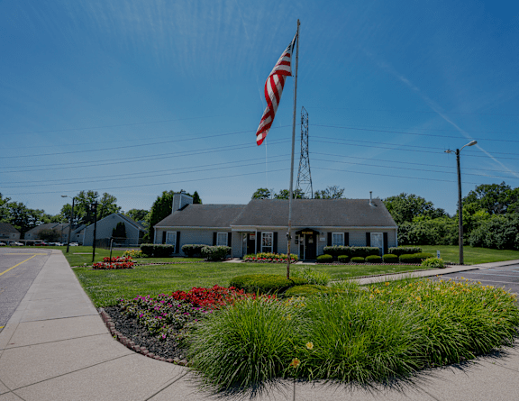 a house with an flag in front of it