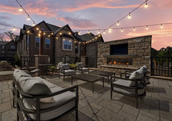 the estates at tanglewood|patio with fireplace and seating area
