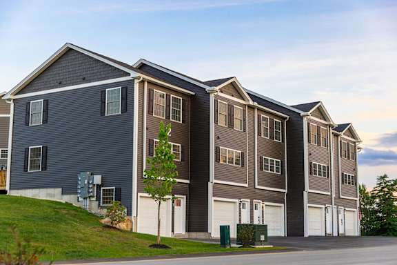 A large apartment complex with multiple buildings and garages.