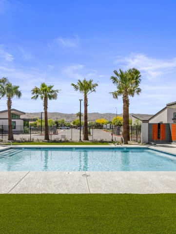 take a dip in the resort style pool at the whispering winds apartments in pearland, tx