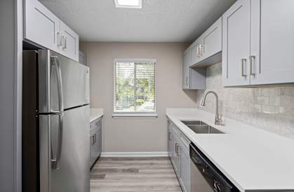 Kitchen with sink at The Madison at Adams Farm, Greensboro, North Carolina