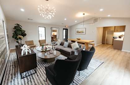 a living room with a couch and a table