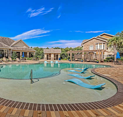 Zero-Entry Pool With Sun Loungers