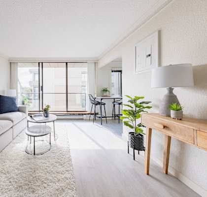 a living room with a couch and a table
