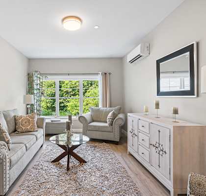 a living room with a couch and two chairs at Lofts at 335, Connecticut, 06615