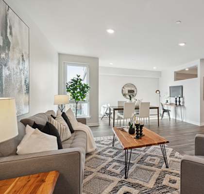 a living room with couches and a table