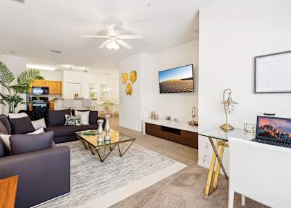 a living room with a couch and a table