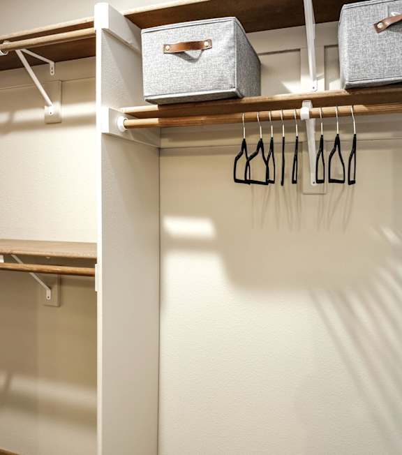 A white closet with two shelves at Tranquility Pointe, Omaha, 68164