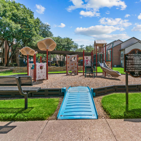 a playground with a slide and other play equipment