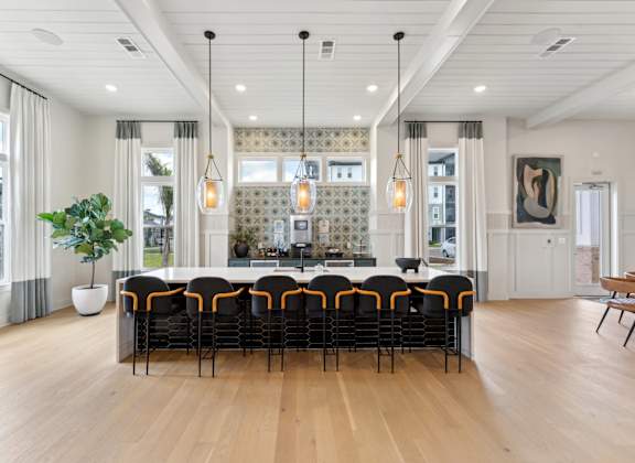 A large conference room with a long table and chairs at The Hendry Apartments, Fort Myers, FL, 33905