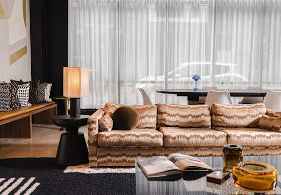 a living room with a couch and a coffee table