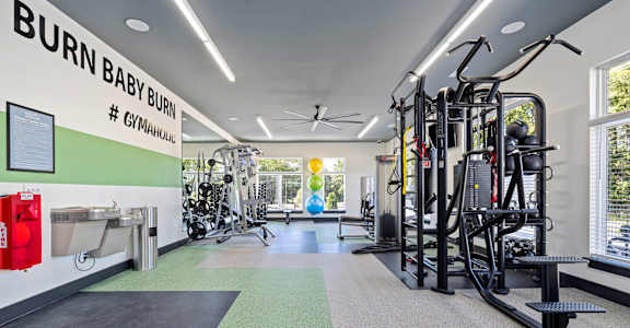 the gym at the flats at big tex apartments