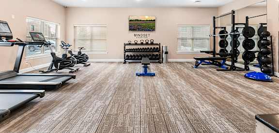 the preserve at ballantyne commons fitness room with weights and cardio equipment