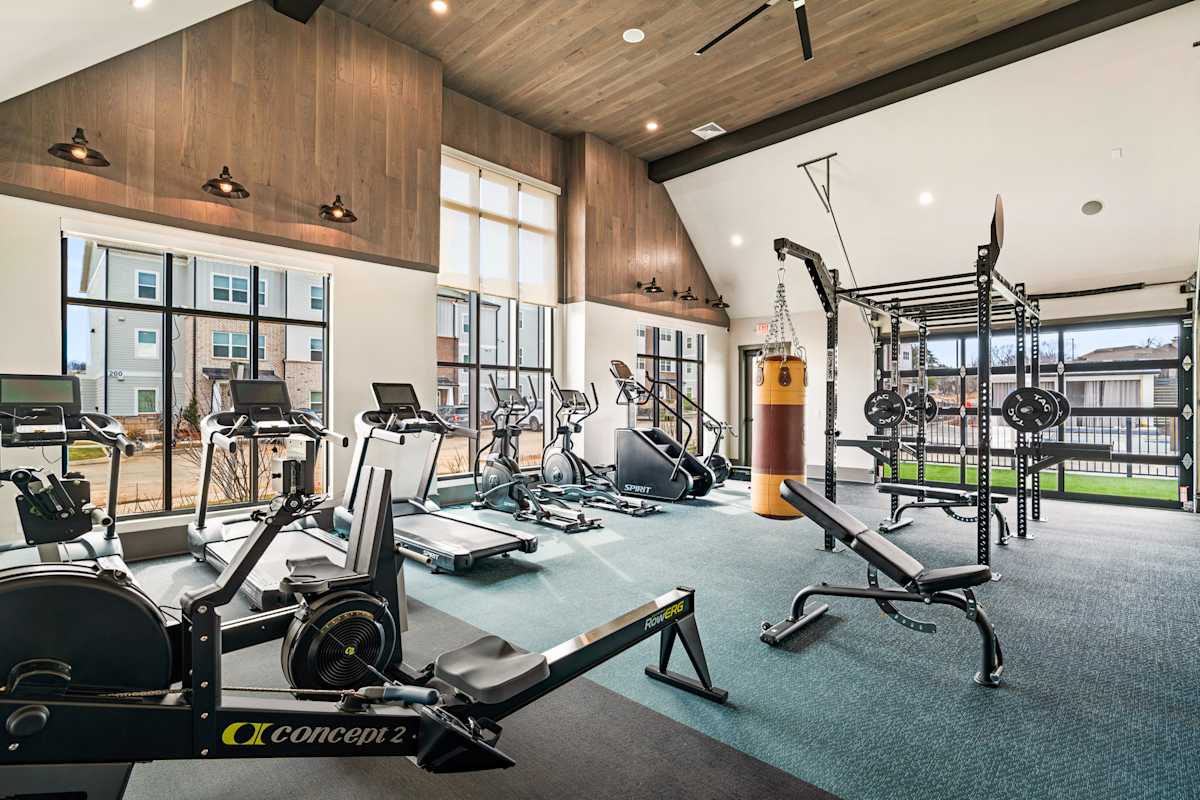Vintage Johnson City Apartments fitness center with cardio and weights - Johnson City, TN
