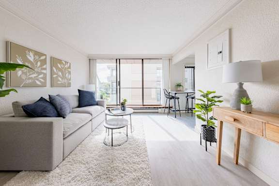 a living room with a couch and a table