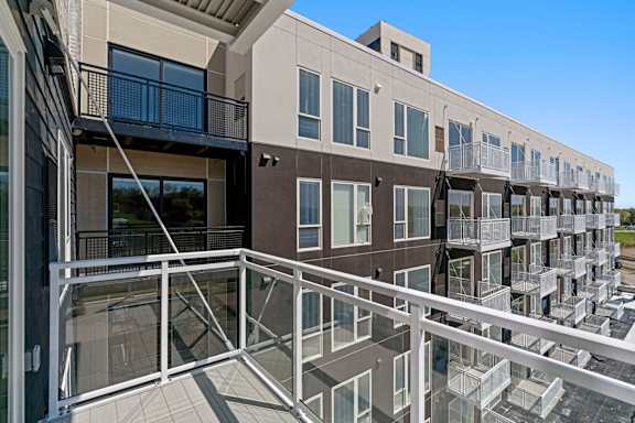 a view of a building from a balcony at The Mera, St Louis Park