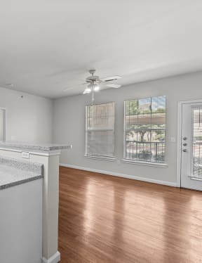 the preserve at ballantyne commons apartment kitchen with black appliances and white cabinets
