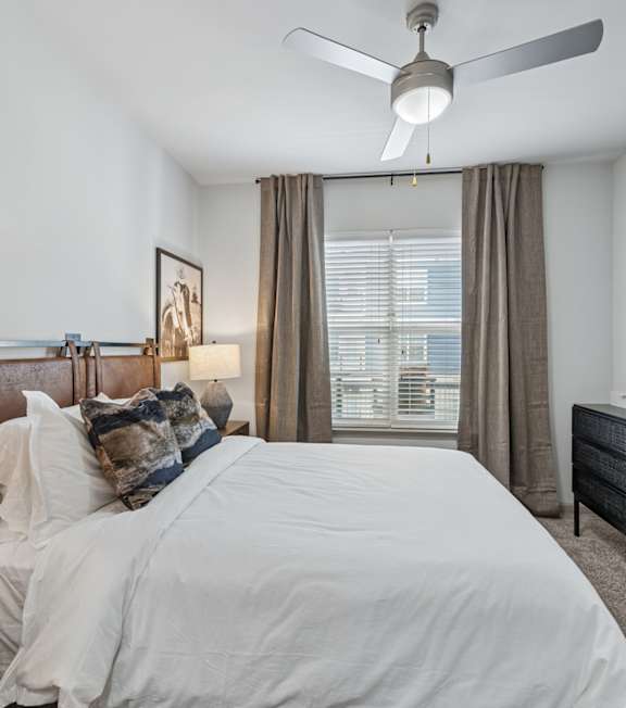 909 Flats Modern Apartments in Nashville, Tennessee Model Bedroom with Carpet