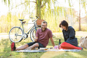 Couple enjoying a picnic on a sunny day in Riverside, California
