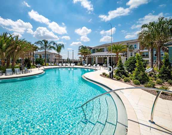 Corban Horizon West Apartments in Winter Garden, Florida Pool with Lounge Chairs