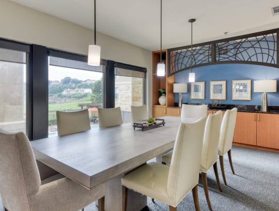 Dining room with table and chairs at Artessa at Quarry Village pet-friendly apartments in San Antonio