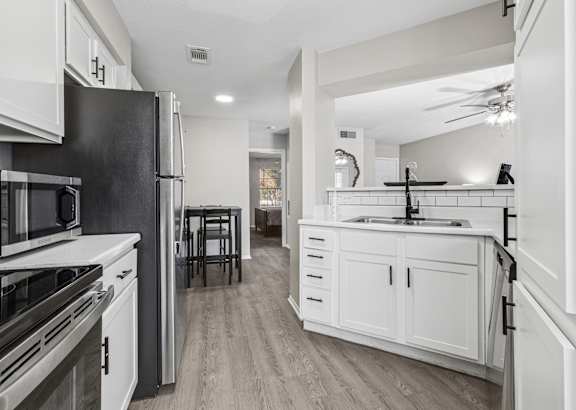 Galley style kitchen at Polo Club Apartments, Austin, TX