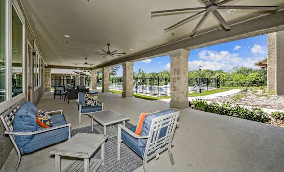  champions gate apartments outdoor lounge area