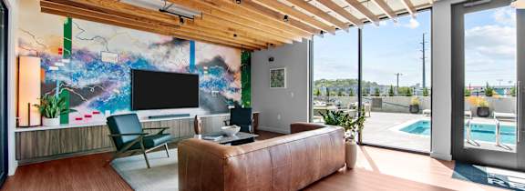 a living room with a couch and a table