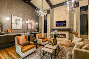 Fireside Lounge with Coffee Bar  at Palm Ranch Luxury Apartments in Davie, FL