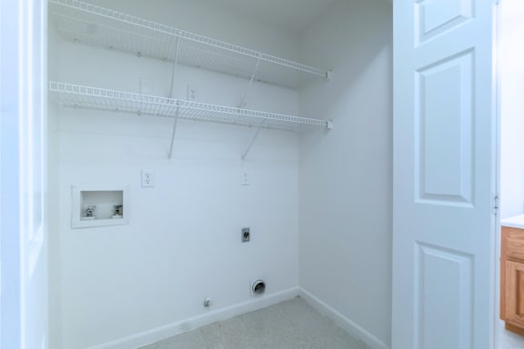 an empty room with a white wall and a white door at Huntington Village **, Georgia