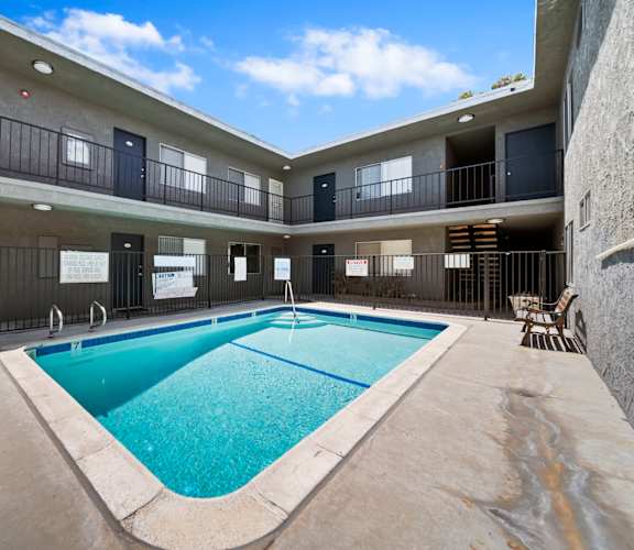 A large indoor swimming pool in a building.