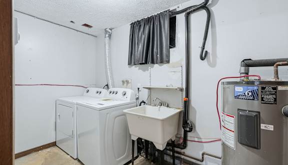 A laundromat with rows of washers and dryers.