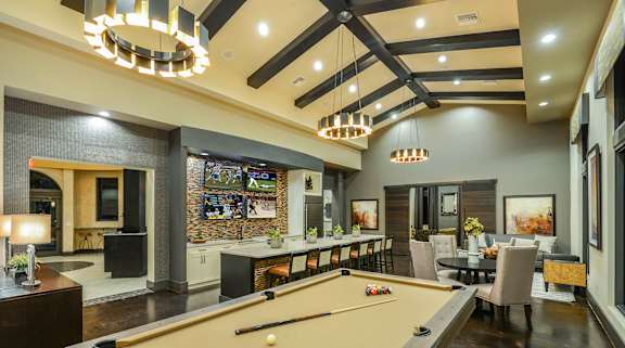 Club Room with Billiards  at Palm Ranch Luxury Apartments in Davie, FL