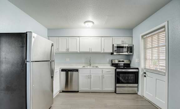 Renovated Apartment Home Kitchen at The Flats at Seminole Heights, Tampa, FL