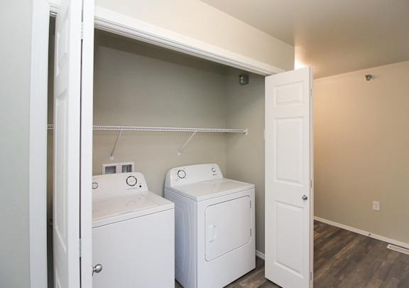 A laundry room with a washer and dryer.
